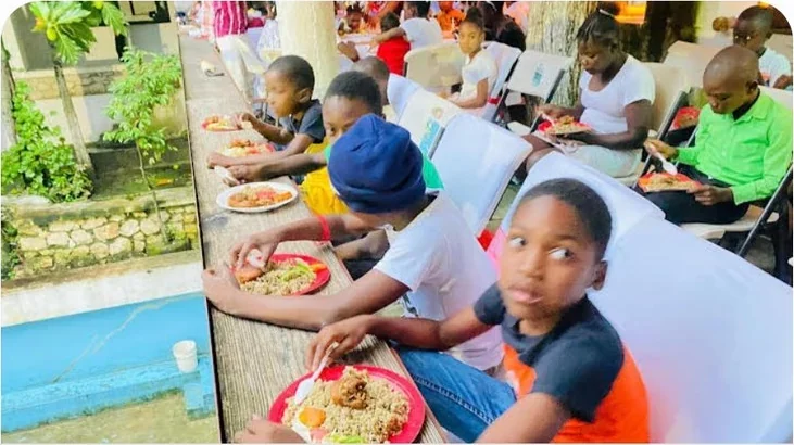 Children sharing a hot meal at a LYNN event